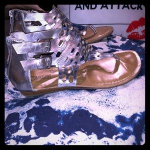 Silver thong sandal.